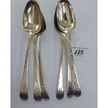 A set of six late 18thC silver Old English pattern dessert spoons with bright-cut engraved stems