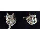 A pair of silver wolf mask cufflinks,