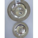 Two silver Armada design dishes, the smaller impressed with a galleon at sea mixed marks 4.