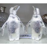 A pair of silver plated condiments pots,