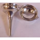 A Georgian silver two part wine funnel with a uniformly perforated bowl marks rubbed 11