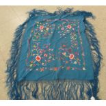 An floral embroidered turquoise silk shawl,