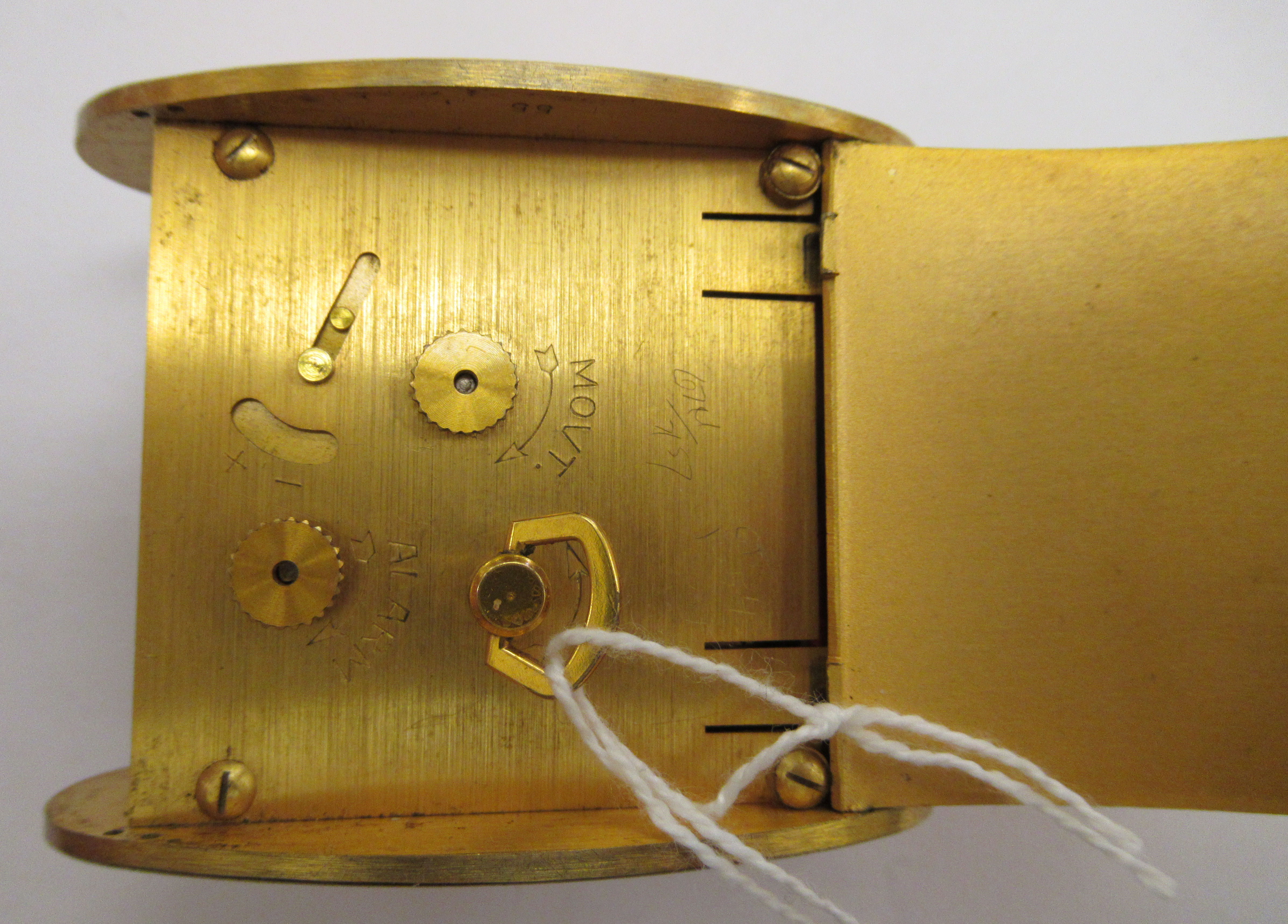 A 1980s brass cased Jaeger travel timepiece; - Image 5 of 5
