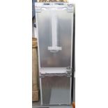 An (unused) Siemans integrated 70/30 fridge/freezer 70''h 22''w LSF