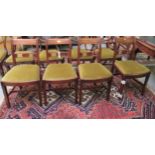 A set of four mid 19thC mahogany framed bar back dining chairs with horizontal splats,