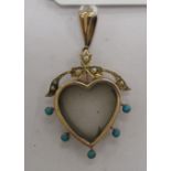 An 'antique' gold coloured metal seed pearl and turquoise set, heart shaped locket,