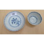 A mid 18thC Nanking Cargo Chinese porcelain tea bowl and saucer bearing a Christies original lot