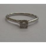 A 9ct white gold diamond solitaire ring boxed 11