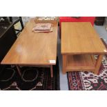 A modern light oak coffee table, raised on square legs, united by an undershelf 17.