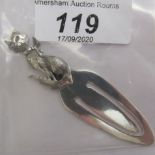 A silver bookmark with a cat finial stamped 925 11