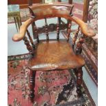 A late 19thC elm and yewwood captain's chair,