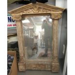 An 'antique' inspired gilt sprayed foam, stone effect pier glass with an arched top,