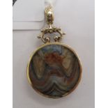 A gold coloured metal pendant fob,