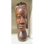 A native carved wooden bust 10''h OS5