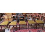A set of five early Victorian walnut framed balloon back chairs,