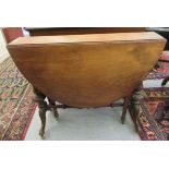 A late Victorian mahogany Sutherland table, the oval top raised on twin pillars,