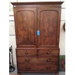An early 19thC mahogany linen press, the upper part with a level cornice, over a pair of arched,