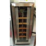 An (unused) CDA wine cooler cabinet 32''h 11.