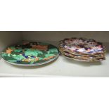 A set of four Royal Crown Derby china wavy edged and gilded plates and a serving dish,