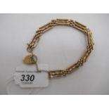 A 9ct gold triple bar gatelink necklace,