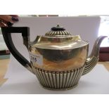 An Edwardian silver teapot of demi reeded form Birmingham 1901 OS10