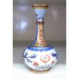 An early 20thC Macintyre Burslem pottery bottle vase of bulbous form, having a narrow,