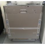 A Grundig (unused) integrated dishwasher 32''h 23.