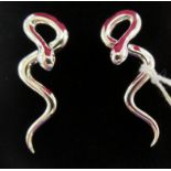 A pair of silver 'snake' earrings 11