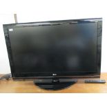 An LG 42'' flatscreen television with a remote control BSR