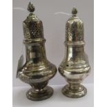 Two similar silver pedestal vase design casters with perforated,