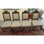 A set of four late Victorian mahogany framed dining chairs, each with an anthemion carved crest,