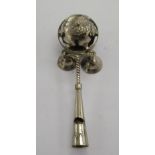 A child's early 20thC silver coloured metal rattle with bells and a whistle OS10