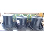 Three Christy's London black silk top hats sizes 7.3/8, 7.25 and 6.