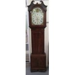 An early 19thC mahogany longcase clock, the hood having a swan neck pediment,