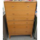 A mid 20thC Stag light oak finished six drawer tallboy,