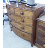 A late Victorian mahogany bow front dressing chest with two short/three long drawers,