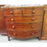 A mid 19thC mahogany bow front dressing chest with two short/three long drawers,