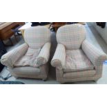 A pair of modern pastel coloured, tartan patterned fabric upholstered armchairs,