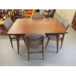A late 1960s teak draw leaf dining table, raised on outstretched, square,