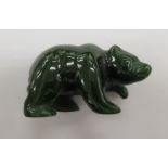 A carved dark green hardstone model bear 2''L 11