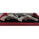 A pair of silver cufflinks,