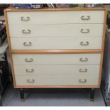 A mid 20thC stag Grange of London light oak and white painted six drawer dressing chest,