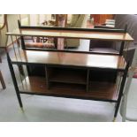 A 1970s teak finished and black lacquered living room unit,