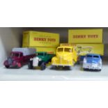 Four boxed Dinky diecast model vehicles, viz. a Hudson Sedan; No.413 Austin covered truck; No.