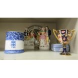 Decorative ceramics: to include a mid 19thC mug, decorated in blue and white,