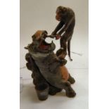 A painted cold cast bronze model, featuring a monkey doing dentistry on a hippopotamus 2.