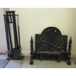 Hearth related items: to include a late 19thC cast iron fireback 21''h 20.