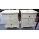 A pair of modern cream painted serpentine front three drawer bedside chests,