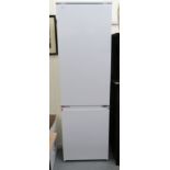 A Smeg (unused) integrated 70/30 fridge/freezer 32''h 21.
