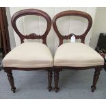 A pair of modern Victorian style mahogany framed balloon back doll's chairs,